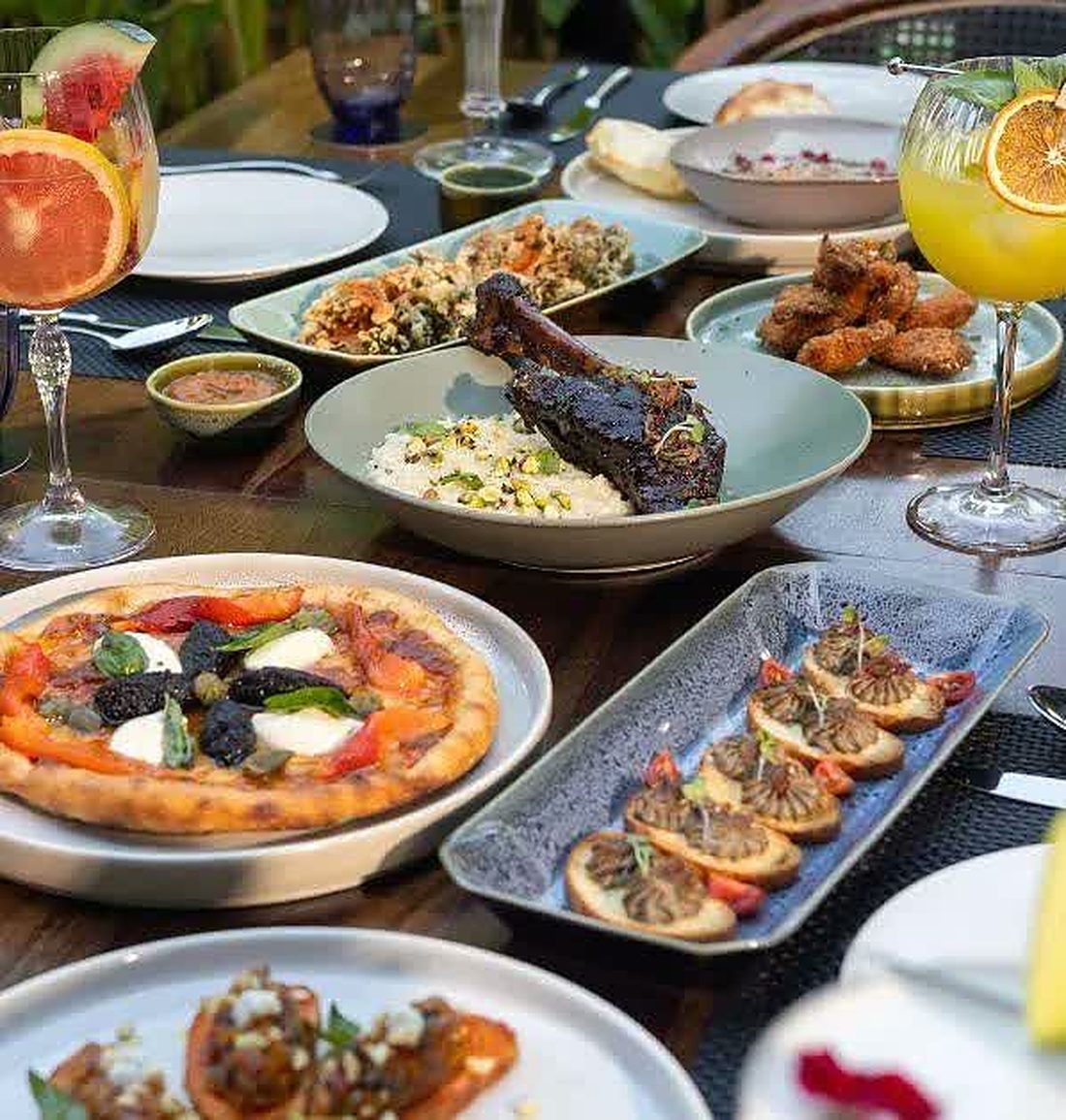 Plates from the kitchen, shared across the table